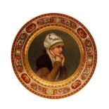 A late 19th Century Vienna cabinet plate decorated with a hand painted portrait of a young lady