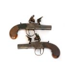 A pair of early 19th Century flintlock pistols with twist off barrels and plain butts (2)