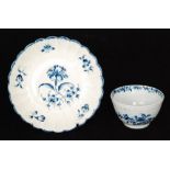 A late 18th Century Worcester tea bowl and saucer decorated in the transfer applied blue and white