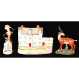 Three 19th Century Staffordshire figures comprising a flatback of Stanfield Hall,