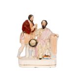 A 19th Century Staffordshire figure depicting Judas paying Pontius Pilate thirty pieces of silver,