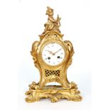 A 19th Century French ormolu mantle clock of rococo form,