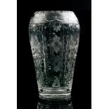 An early 20th Century Stourbridge clear crystal glass vase of barrel form,