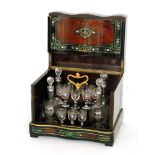 A 19th Century liqueur decanter set comprising four decanters and stoppers and sixteen glasses