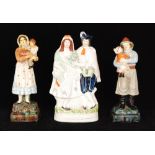 A pair of 19th Century Wayte & Ridge salt glazed figures of a lady and gentleman fisherfolk,