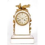 A 19th Century white marble and ormulu mounted mantle clock decorated with birds and flowers,