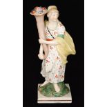 An early 19th Century Staffordshire Neale & Co figure modelled as Pomona (or Ceres),