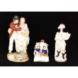 Three 19th Century Staffordshire figures comprising Persuasion or Buttercup Girl,