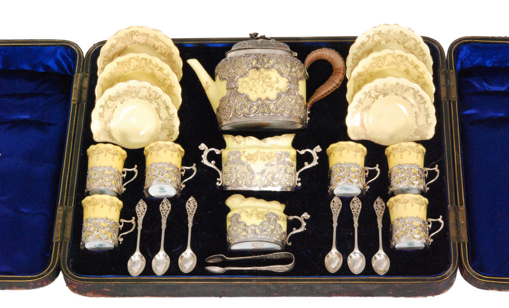 A matched early 20th Century cased coffee set comprising coffee pot, milk jug,