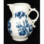 A late 18th Century Worcester cabbage leaf jug decorated with blue and white floral sprays with a