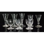 A collection of 18th Century and later drinking and table glasses to include plain and moulded