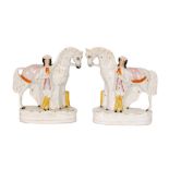 A pair of 19th Century Staffordshire facing figures modelled as John Solomon Rarey and Cruiser,