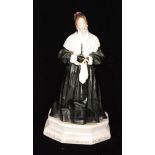 An early 20th Century Royal Doulton figure 'Mr W.S Penley as Charley's Aunt' HN35, modelled by A.