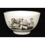 A late 18th Century Worcester footed tea bowl decorated in the black and white transfer applied