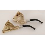 A Victorian carved meerschaum pipe in the form of buffalo stamped R.A.O.