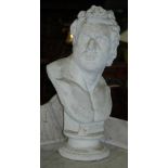 A 20th Century plaster bust of a classical male facing right on turned socle base,