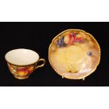 A matched Royal Worcester Fallen Fruits cabinet teacup and saucer,