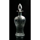 An early 20th Century John Walsh Walsh clear crystal decanter of baluster form,