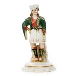 A 19th Century Staffordshire theatrical figure titled to the base in puce 'Costume de MENIER role