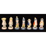 Seven assorted 19th Century Staffordshire condiments each formed as a Toby to include oil and