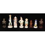 Eight assorted 19th Century Staffordshire condiments to include a pepper pot formed as a clown and