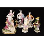 Six assorted later 20th Century continental figures to include a market seller,