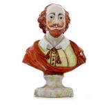 A 19th Century Staffordshire pearl ware bust of William Shakespeare on a moulded socle base with