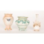 Three early 20th Century Hadley's Worcester miniature vases of varying form each decorated with