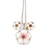 Aksel Holmsen - A 1960s Norwegian silver gilt and enamel rose pendant and matching clip earrings,