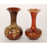 Christopher Dresser - Linthorpe Pottery - A shape 118 vase of globe and shaft form decorated with a