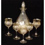 Cornelis De Lorm - Leerdam - A 1920s 'Normaal I' glass suite comprising a conical form decanter,