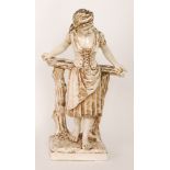 Bretby - A large early 20th Century model of a lady stood leaning against a wooden fence,