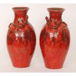 Baron Barnstaple - A large pair of late 19th to early 20th Century baluster vases each decorated