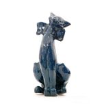 C.H Brannam - A 1920s blue glazed model of a comical cat wearing a bow tie, unmarked, height 32cm.