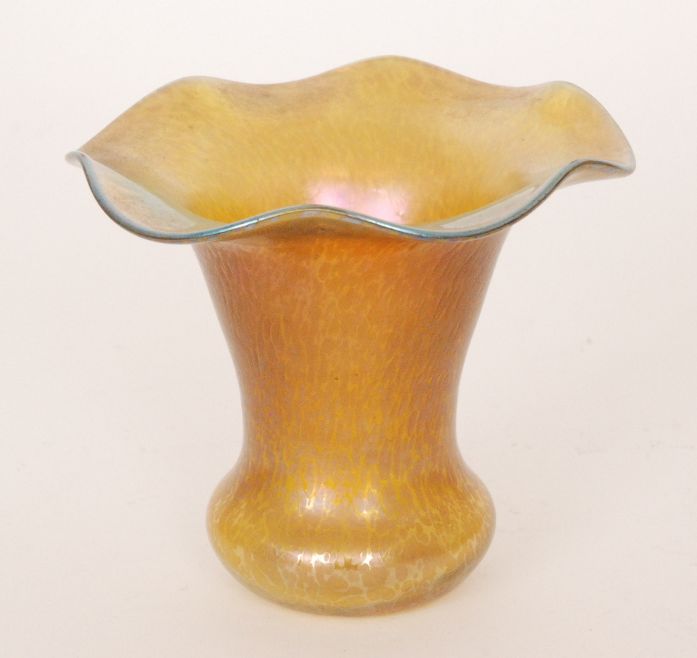Loetz - An early 20th Century glass vase of flared form to a wide wave rim in a Candia Papillon