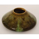 Christopher Dresser - Linthorpe Pottery - A vase of compressed conical form decorated with a