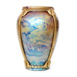 Zsolnay Pecs - An early 20th Century Art Nouveau vase of tapering form decorated with an iridescent