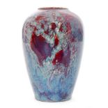 Ruskin Pottery - A small early 20th Century high fired vase of shouldered form decorated in a