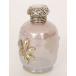 Loetz - An early 20th Century glass scent bottle of footed sleeve form with two applied opposing