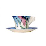 Clarice Cliff - Rudyard - A Daffodile shape coffee cup and saucer circa 1933,