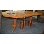 Dyrlund, Danish - A teak extending dining table of octagonal form,