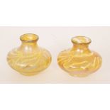 Kralik - A pair of early 20th Century glass vases of low shouldered form decorated with self