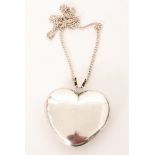 Arne Johansen - A 1970s Danish Sterling silver large heart shaped pendant suspended from a curb