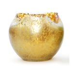 Loetz - An early 20th Century glass vase of ovoid form with a triform folded rim in a Candia