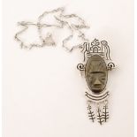 Unknown - A 1980s Mexican silver pendant brooch with carved obsidian depicting an Aztec mask,