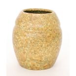 Ruskin Pottery - A small vase of swollen form decorated with a mottled tonal brown and green