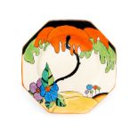 Clarice Cliff - Woodland - An octagonal side plate circa 1930 transfer printed and painted with a