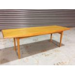 Amended description - Trevor Chinn for Gordon Russell Furniture - A rectangular oak coffee table on