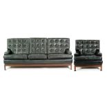 Unknown - A black leather three piece lounge suite to comprise a pair of armchairs, height 84cm,