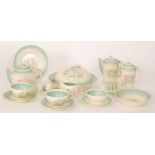 Susie Cooper - A 1930s Kestrel shape tete a tete breakfast set decorated in the Dresden Spray